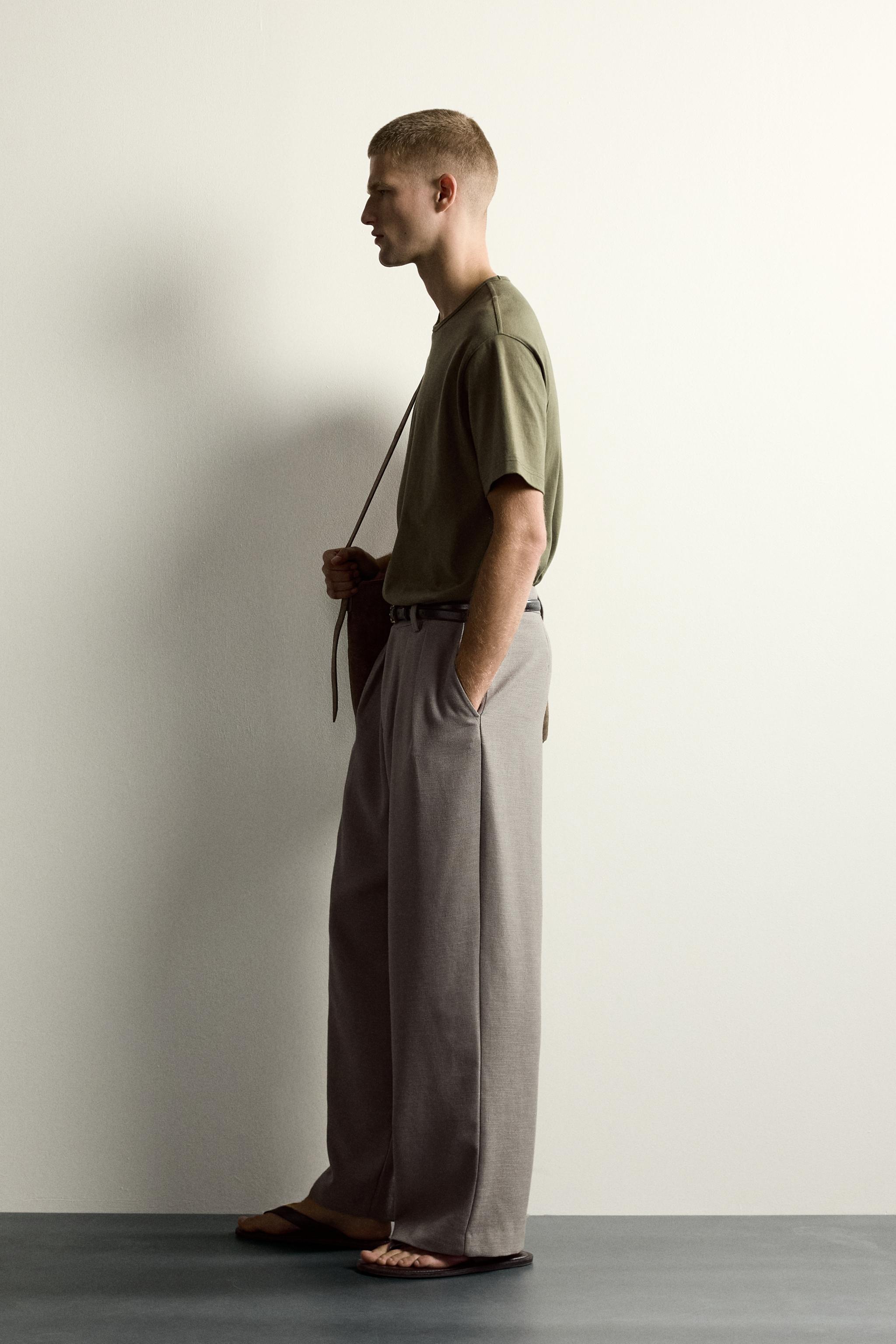 RELAXED FIT STRUCTURED PLEATED PANTS